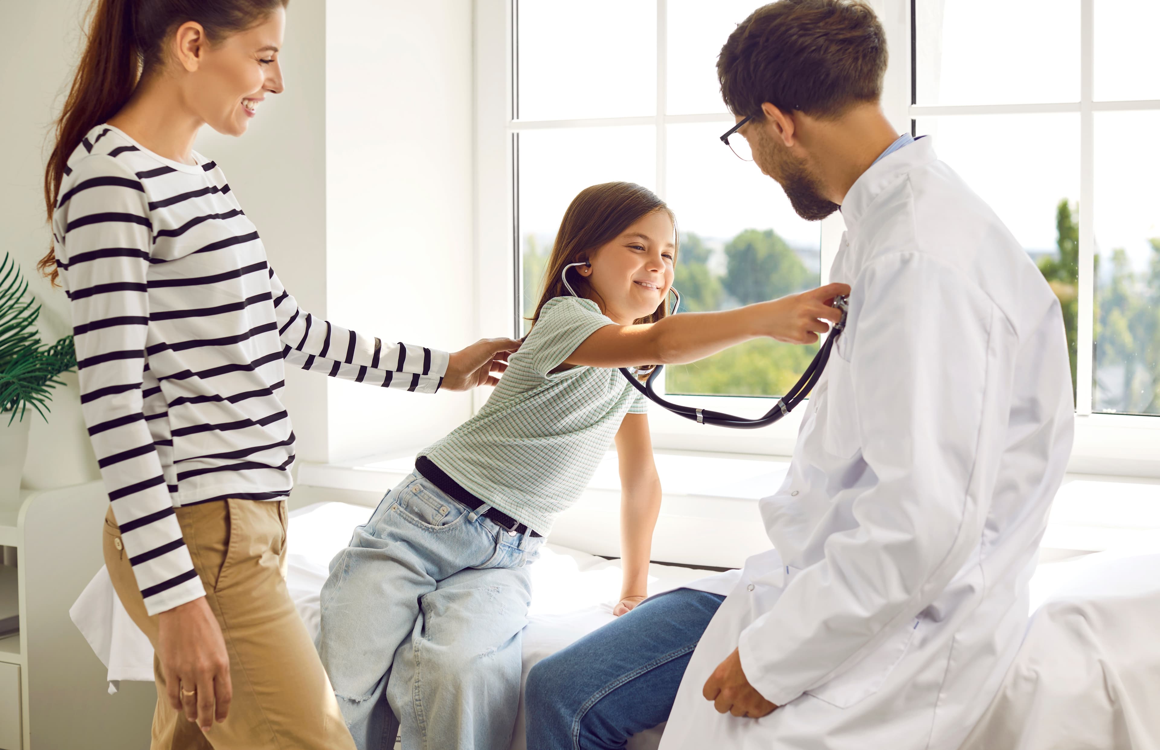 Ansley Grove physician welcoming a new family patient
